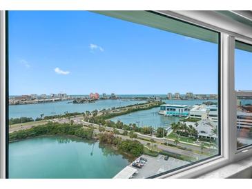 Expansive water view from the condo's large picture windows, showing the inter-coastal waterway and beach at 31 Island Way # 1507, Clearwater Beach, FL 33767