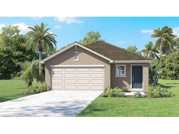 Charming single-story home with a lush lawn, palm trees, and a two-car garage at 35895 Sunflower Hill Dr, Zephyrhills, FL 33541