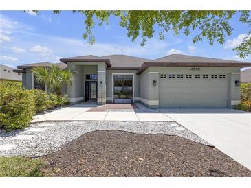 Charming single-story home with neutral paint, manicured landscaping, and a well-maintained front yard at 4535 29Th Avenue E Cir, Palmetto, FL 34221