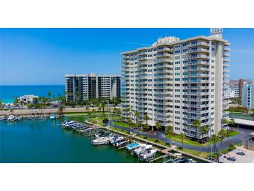 Harbourside condo with boat slips, waterfront views, and palm trees in a tropical location at 1621 Gulf Blvd # 1604, Clearwater Beach, FL 33767