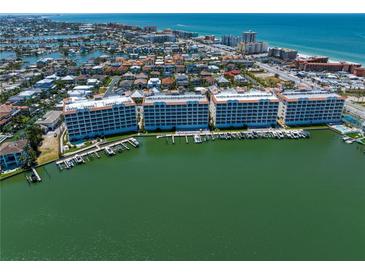 An aerial view of the condo community and surrounding waterfront at 17735 Gulf Blvd # 304, Redington Shores, FL 33708