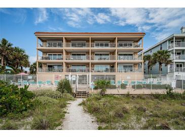 Stunning beachfront condo with multiple balconies and direct beach access for easy coastal living at 1912 Gulf Blvd # 305, Indian Rocks Beach, FL 33785