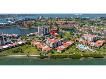 Beautiful aerial view showcasing the waterfront property, landscaping, and community amenities at 6295 Bahia Del Mar Cir # 406, St Petersburg, FL 33715