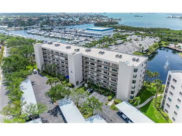 Spacious condo building with harbor views and lush landscaping, convenient parking, near recreational facilities at 1316 Pasadena S Ave # 303, South Pasadena, FL 33707