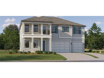 Charming two-story home featuring a balcony, neutral colors, well-manicured lawn, and an attached two car garage at 6909 E 116Th Ct, Palmetto, FL 34221