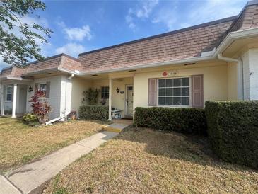 Charming single-story home with tidy landscaping and a welcoming front entrance at 1654 S Lake Ave # 2, Clearwater, FL 33756