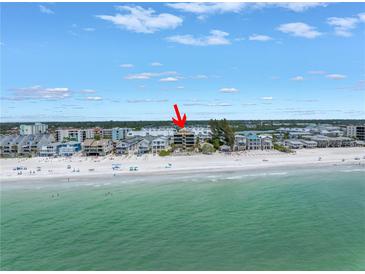 Stunning aerial view of beachfront condo with pristine beach and Gulf of Mexico access at 19910 Gulf Boulevard # 102, Indian Shores, FL 33785