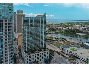 Stunning aerial view of a downtown highrise with beautiful water views and modern architecture at 777 N Ashley Dr # 1011, Tampa, FL 33602