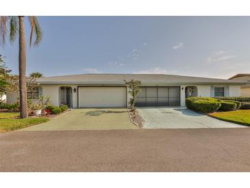 Charming single story home with a well-manicured lawn and two-car garage at 2115 N Halcyon Dr # 510, Sun City Center, FL 33573