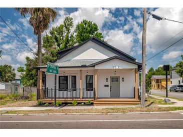 Charming updated home with a welcoming front porch and modern exterior at 2718 N 21St St, Tampa, FL 33605