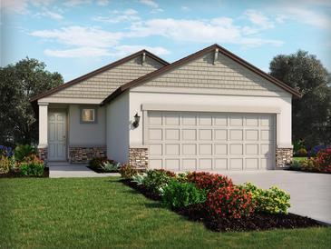 Charming single-Gathering home showcasing manicured landscaping and a neutral color palette, enhancing its curb appeal at 1877 Brekey Way, Zephyrhills, FL 33541