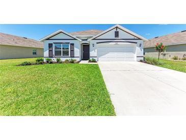 Charming single-Gathering home with a well-manicured lawn and inviting curb appeal at 10732 Chippewa Dr, Parrish, FL 34219