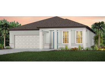 Charming single-story home featuring a neutral color palette, well-manicured lawn, and an attached two-car garage at 12626 Glenn Creek Dr, Riverview, FL 33569