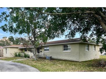 Charming single-story home featuring a well-maintained lawn and lovely curb appeal at 1500 Ohio Ne Ave, St Petersburg, FL 33703