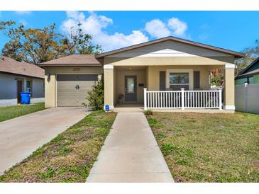 Charming single-story home with a well-manicured lawn and a cozy, inviting front porch at 3613 21St S Ave, St Petersburg, FL 33711