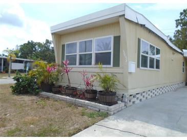 Charming single-story home with tidy landscaping and a well-maintained exterior at 5434 Fairfield S Ave # 1, Gulfport, FL 33707