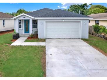 Charming single-story home with a well-maintained front yard and a two car attached garage at 4071 45Th N Ave, St Petersburg, FL 33714