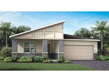 Charming single-Gathering home with craftsman details, a well-kept lawn and landscaping, and a two-car garage at 5009 124Th E Ave, Parrish, FL 34219