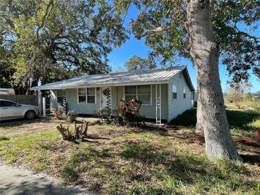 Charming single-story home with mature trees in a quiet, residential neighborhood at 701 54Th S St, Gulfport, FL 33707