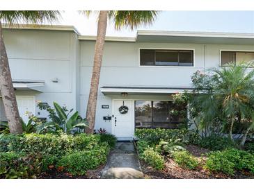 Charming townhome featuring lush landscaping and a welcoming front entrance, close to all community ammenities at 108 Biscayne Ave # B, Tampa, FL 33606