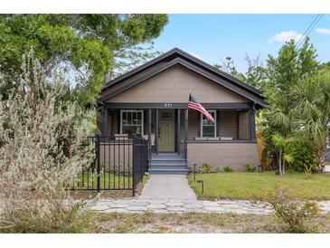 Charming single-story home with inviting front porch and well-maintained landscaping at 931 28Th N Ave, St Petersburg, FL 33704