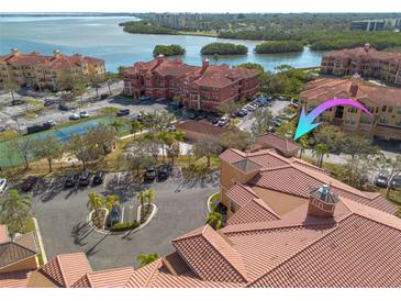 An aerial view of a multi-Gathering complex with water views and ample parking at 2722 Via Tivoli # 430A, Clearwater, FL 33764