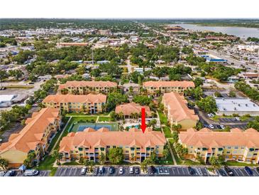 Aerial view of the Beachway Condominiums community with lush landscaping and beautiful buildings at 10764 70Th Ave # 6210, Seminole, FL 33772