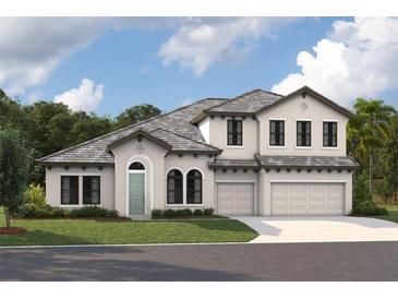 Charming two-story home boasts a neutral color palette and a well-manicured lawn at 165 Hidden Estates Ct, Brandon, FL 33511