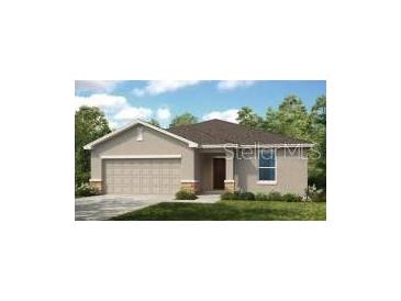 Charming single-story home featuring a neutral color palette, well-manicured lawn, and an attached two-car garage at 13621 Tropical Breeze Way, Hudson, FL 34669