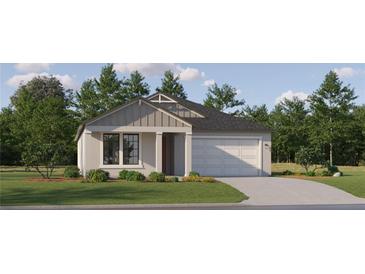 Charming one-story home with a well-manicured lawn and attached two car garage at 7545 E 116Th St, Palmetto, FL 34221