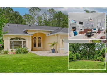 Charming single-story home with a well-manicured lawn, elegant arched entryway, and an attached two car garage at 13038 Royal George Ave, Odessa, FL 33556