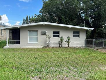 Charming single-story home with a freshly painted exterior and well-maintained front yard at 5843 114Th N Ter, Pinellas Park, FL 33782