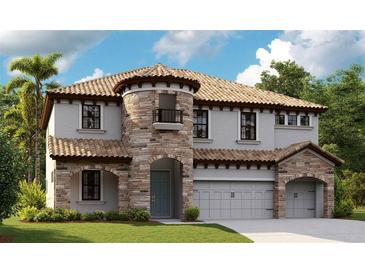 Two-story home features a unique turret, stone accents, tile roof, and an attached two-car garage at 14930 Rider Pass Dr, Lithia, FL 33547