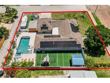 Expansive backyard with pool, playground, and boat storage, all within a fully fenced property at 5401 3Rd N Ave, St Petersburg, FL 33710