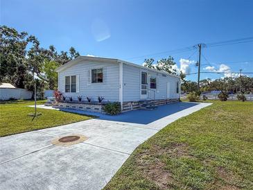 Charming single-story home featuring a well-maintained lawn and inviting curb appeal at 4609 10Th Street E Ct, Ellenton, FL 34222
