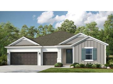 Charming home featuring a three-car garage and attractive curb appeal with lush greenery surrounding the property at 3411 Lumber Falls Dr, Plant City, FL 33565