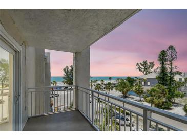 Enjoy beach views and gorgeous sunsets from this unit's private balcony at 200 1St Ave # 406, St Pete Beach, FL 33706