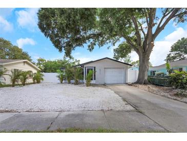 Charming single-story home with a well-maintained front yard and a one-car garage at 5413 15Th Ave S, Gulfport, FL 33707