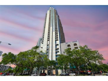 Modern high-rise building with floor-to-ceiling windows and balconies at 777 N Ashley Dr # 3009, Tampa, FL 33602