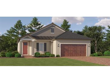 Charming one-story home with a brick driveway, attached garage, and inviting red front door at 11809 Sparkling Topaz Cv, Parrish, FL 34219