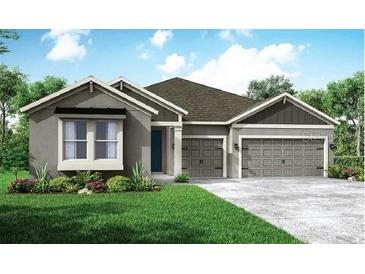 Charming single-story home with a two-car garage, landscaped yard, and a welcoming front entrance at 15725 Rosebud Ct, Punta Gorda, FL 33982