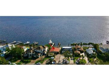 Waterfront home boasts stunning views and private dock access for boating and enjoying waterfront living at 3227 Bayshore Ne Blvd, St Petersburg, FL 33703
