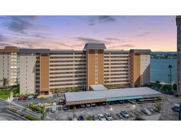 Multi-story condo building with assigned parking and water views showcases a coastal living experience at 5130 Brittany S Dr # 604, St Petersburg, FL 33715