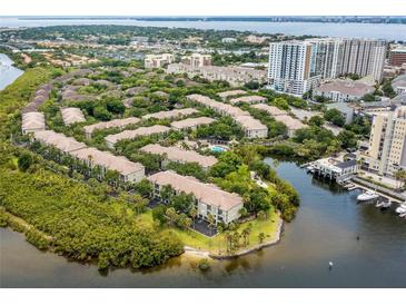 Beautiful waterfront condos with pool, surrounded by lush landscaping, near downtown at 716 Promenade Pl, Tampa, FL 33602