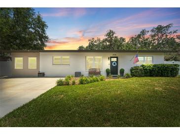 Charming single story home with well-manicured lawn and updated windows at 3418 W Bay Ave, Tampa, FL 33611
