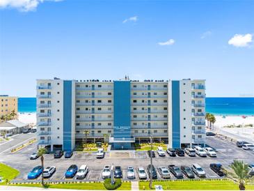 Stunning beachfront condo building with ample parking and beautiful Gulf views at 13500 Gulf Blvd # 706, Madeira Beach, FL 33708
