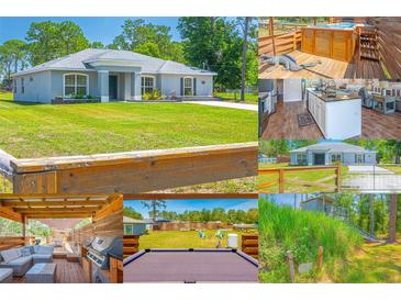 Beautiful single-story home with lush lawn, fenced backyard, deck, hot tub, grill, and pool table perfect for outdoor living at 15207 Taralane Ave, Brooksville, FL 34604