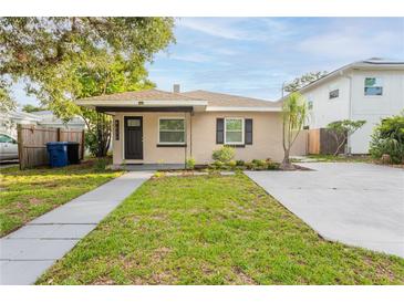Charming single-story home with a well-manicured lawn and updated exterior at 4611 17Th N Ave, St Petersburg, FL 33713