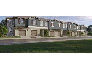 Charming townhome community with manicured lawns and attached garages in a desirable neighborhood at 9337 Bonita Mar Dr, Parrish, FL 34219