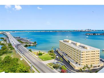 Stunning waterfront condo with panoramic views of the bay, bridge, and surrounding cityscape at 100 Bluff View Dr # 404C, Belleair Bluffs, FL 33770